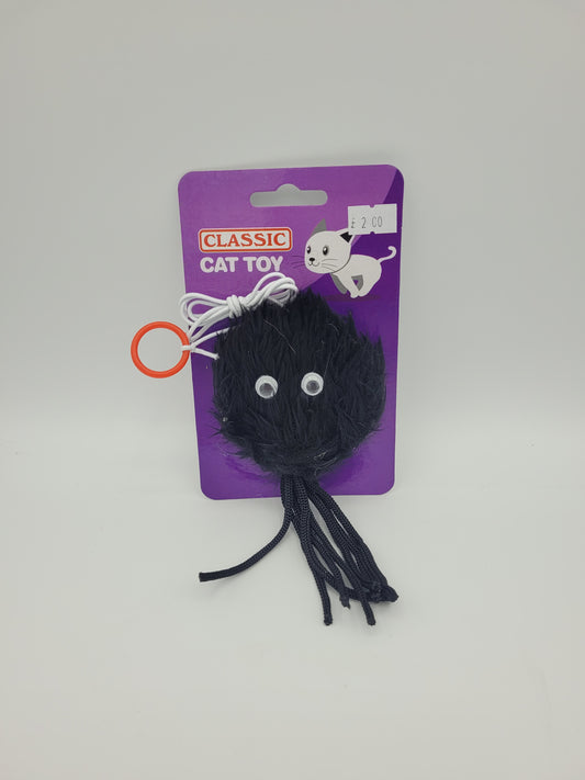 Black creature cat toy.